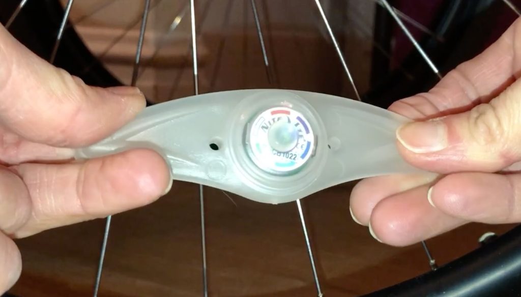 Back of spoke light, showing battery inside